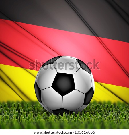 Soccer ball on grass against National Flag. Country Germany
