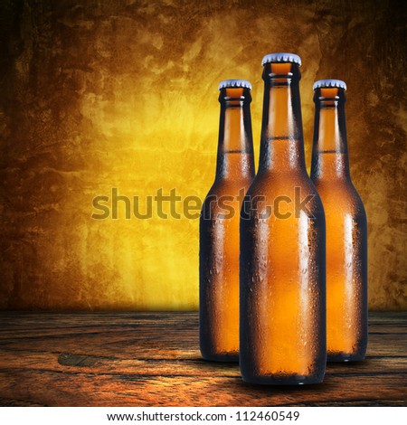 Close up of three beer bottles. Cold refreshment