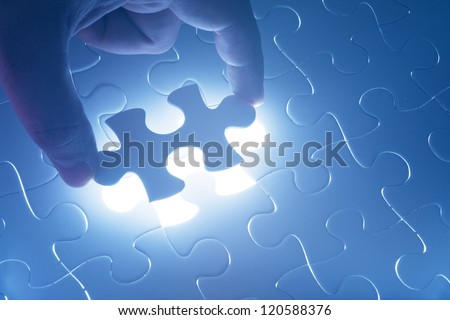 Missing Jigsaw Puzzle Piece With Light Glow, Business Concept For Completing The Final Puzzle Piece