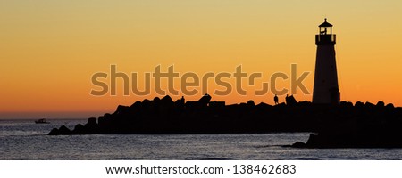 Silhouette Light house at sunset, Santa Cruz, California, USA