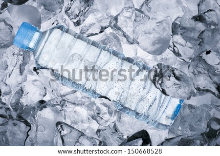 Drinking water bottle on ice cube