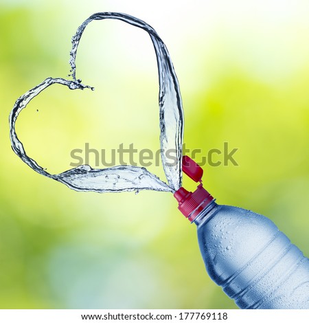Water Bottle Splash to form Heart Shape with summer scene background