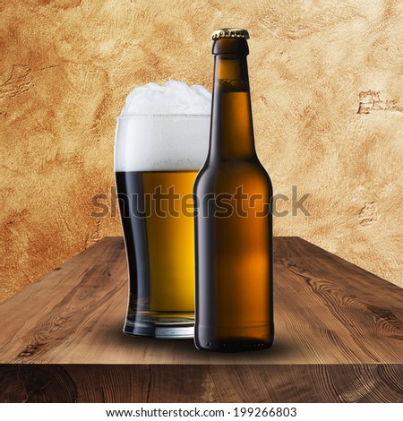 Beer Bottle with Beer Glass on Wood Table
