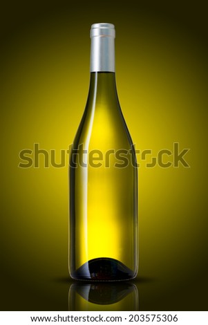 White wine bottle on yellow background