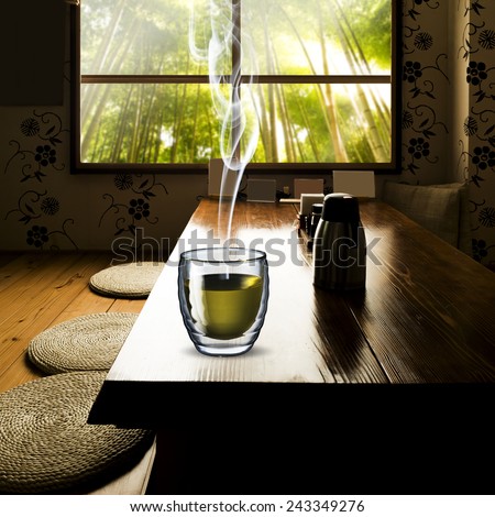 Glass of Green Tea on wood table in Japanese Style Tea House