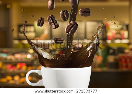 Coffee Splash from Cup With Coffee Beans Falling and Coffee Shop in Background