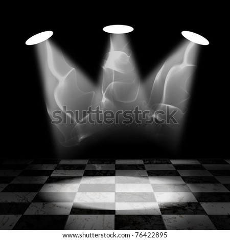Three spotlights in theater with black and white chess floor