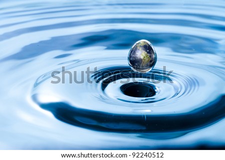 Round water drop of water with earth inside. Concept for environmental awareness. Go Green. Save the earth.