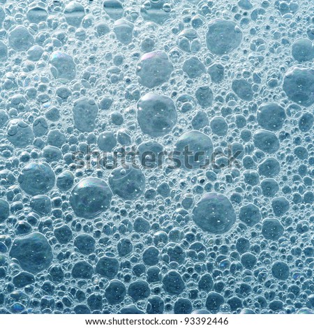 Soap Bubbles on blue background