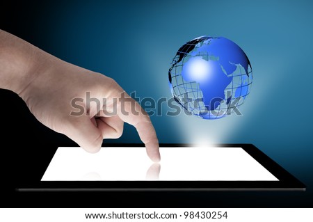 Businessman touch tablet PC screen with blue internet globe coming out from the screen. Concept for internet and connectivity
