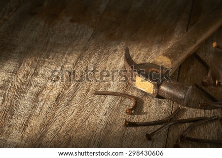 old hammer and rusty nails