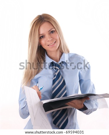 Blond girl in a blue shirt to examine documents.
