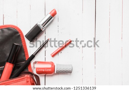 Color of the year 2019 Living coral . COY Livingcoral. women\'s cosmetics, nail polish and lipstick. flatlay