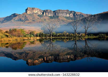 Sandstone Mountains With Symmetrical Reflection In Water, Royal Natal National Park, South Africa