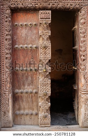 Antique, hand crafted wooden door, Stone Town, Zanzibar