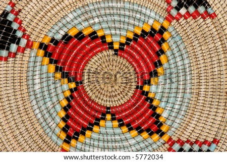 Colorful pattern on a hand woven African basket