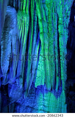 Colorful illuminated stalactites in the Reed flute cave, Guilin, China