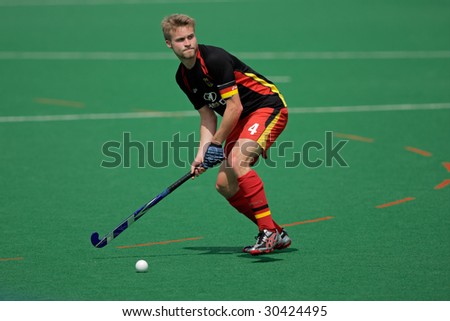 BLOEMFONTEIN, SOUTH AFRICA - MARCH 14: A German player in action during an international men\'s field hockey game between Germany and South Africa March 14, 2009 in Bloemfontein. Germany won 4-3.