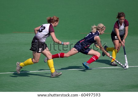 BLOEMFONTEIN, SOUTH AFRICA - AUGUST 7: Unidentified players during a women’s field hockey match between the North West and Free State Universities, on Aug 7., 2010 in Bloemfontein, South Africa.