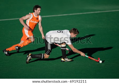 BLOEMFONTEIN, SOUTH AFRICA - JANUARY 16: Unidentified players during a men\'s field hockey game between Germany and Netherlands (Netherlands won 2-1) on January 16, 2010 in Bloemfontein, South Africa.