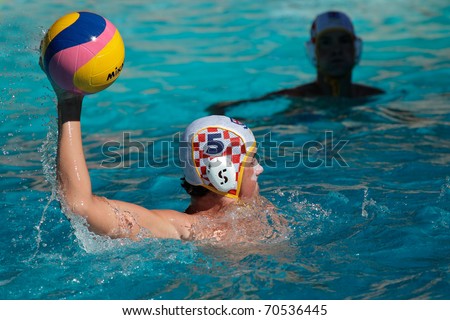BLOEMFONTEIN, SOUTH AFRICA - JANUARY 29: Unidentified water polo players in action during the annual Grey College water polo tournament on January 29, 2011 in Bloemfontein, South Africa