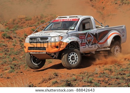 BLOEMFONTEIN, SOUTH AFRICA - OCTOBER 15: Jannie Visser and Joks le Roux in their Toyota Hilux in action during a South African off road championship event, Bloemfontein, South Africa, 15 October 2011