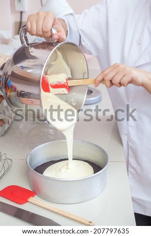 Pouring Cake Mixture Into Baking Tin