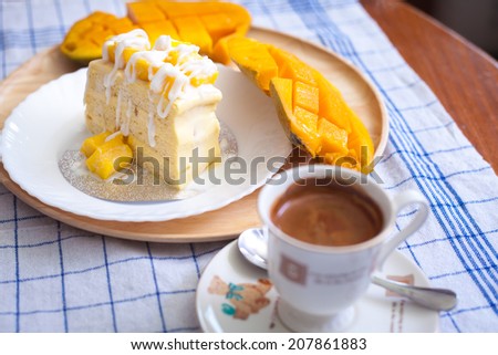 Mango Cake whit coffee cup