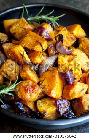 Roasted sweet potato with red onion and rosemary.