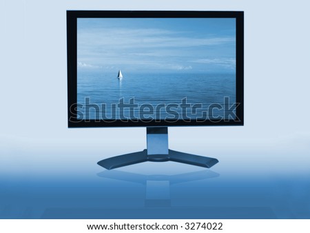 LCD monitor with image of yacht sailing on a calm blue sea.  This is a 24\