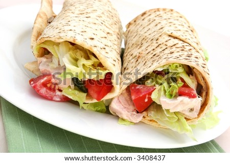 Chicken wrap sandwich ~ organic grilled chicken with fresh salad.