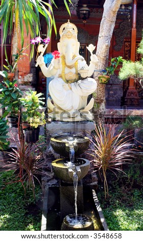 Ganesh, the elephant-headed god of wisdom, prosperity and good fortune.  In a Balinese garden.