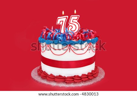 75th cake with numeral candles, on vibrant red background.