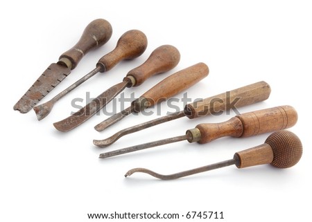 Vintage woodworking tools, isolated on white. Well-used for many years 
