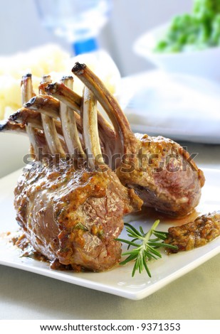 Rack of lamb with a mustard and garlic sauce.