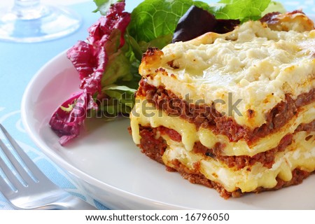 Beef lasagne with salad.  Melting mozzarella and ricotta cheeses - delicious!