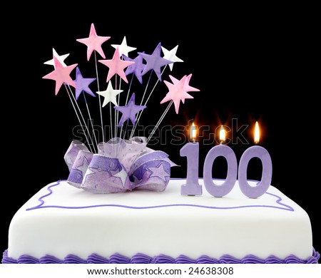 birthday cake 100 candles. stock photo : Fancy cake with number 100 candles. Decorated with ribbons and 