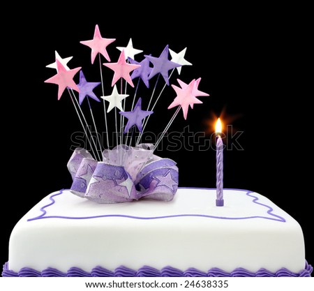 Fancy cake with a single lit candle.  Pastel tones, with ribbons and stars.
