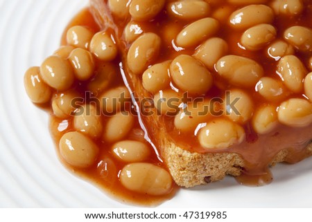 Baked beans in tomato sauce, over sourdough toast.