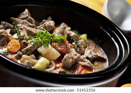 Beef Stew in a slow-cooker, ready to serve.