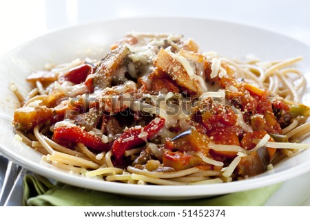 Wholewheat spaghetti with a healthy vegetable sauce, topped with parmesan and mozzarella cheeses.