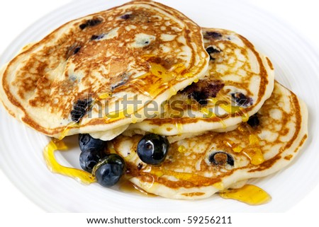 Buttermilk blueberry pancakes with maple syrup.  Delicious!