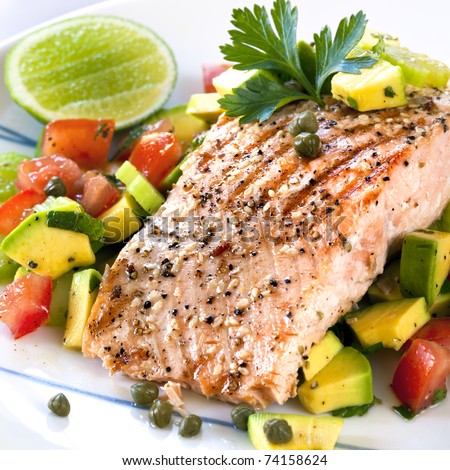 Grilled Atlantic salmon with an avocado and tomato salsa.  Delicious healthy eating.