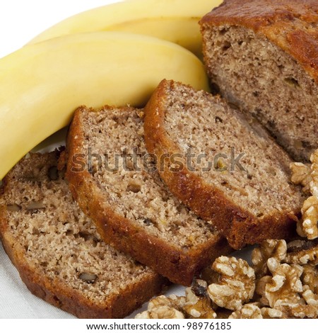 Fresh banana and walnut bread loaf, sliced.  Delicious healthy eating.