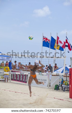 GRAND CAYMAN, CAYMAN ISLANDS - MARCH 27: Female volleball players at the NORCECA beach volleyball competition March 27, 2011 in Grand Cayman, Cayman Islands