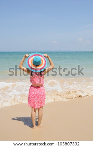Happy Woman running on the beach in Krabi Thailand