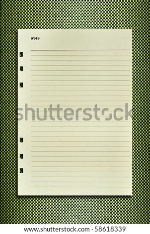 Paper notebook on leather pattern background for text