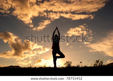 Relax yoga woman and sunset silhouette