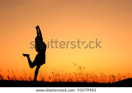 Relax woman and sunset silhouette