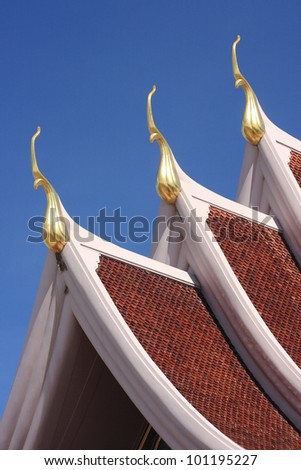 Gable apex on the roof of royal temple in Rayong, thailand.